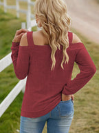Women's elegant cold shoulder blouse with cutout details, chic casual polyester top by Trendsi, stylish and comfortable for everyday wear.