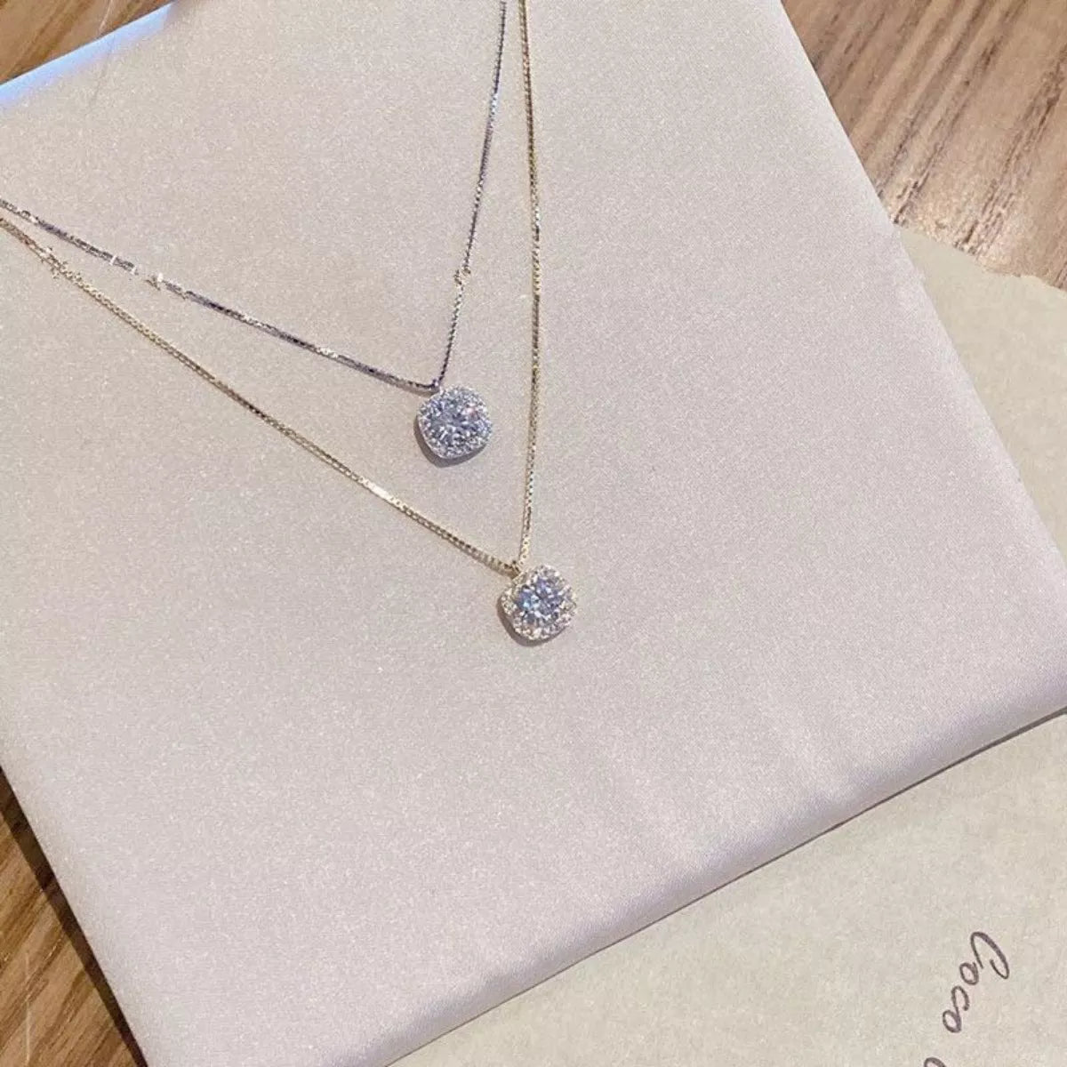 925 sterling silver zircon pendant necklace with a sparkling stone, displayed on a delicate chain.