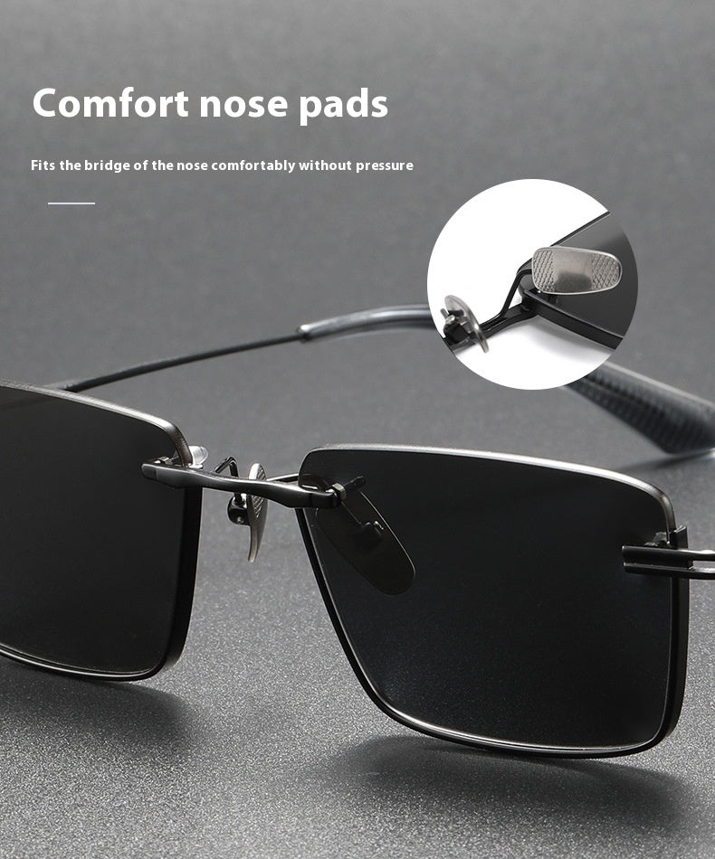 Pure titanium polarized sunglasses with retro British style, featuring sleek black frames and tinted lenses.