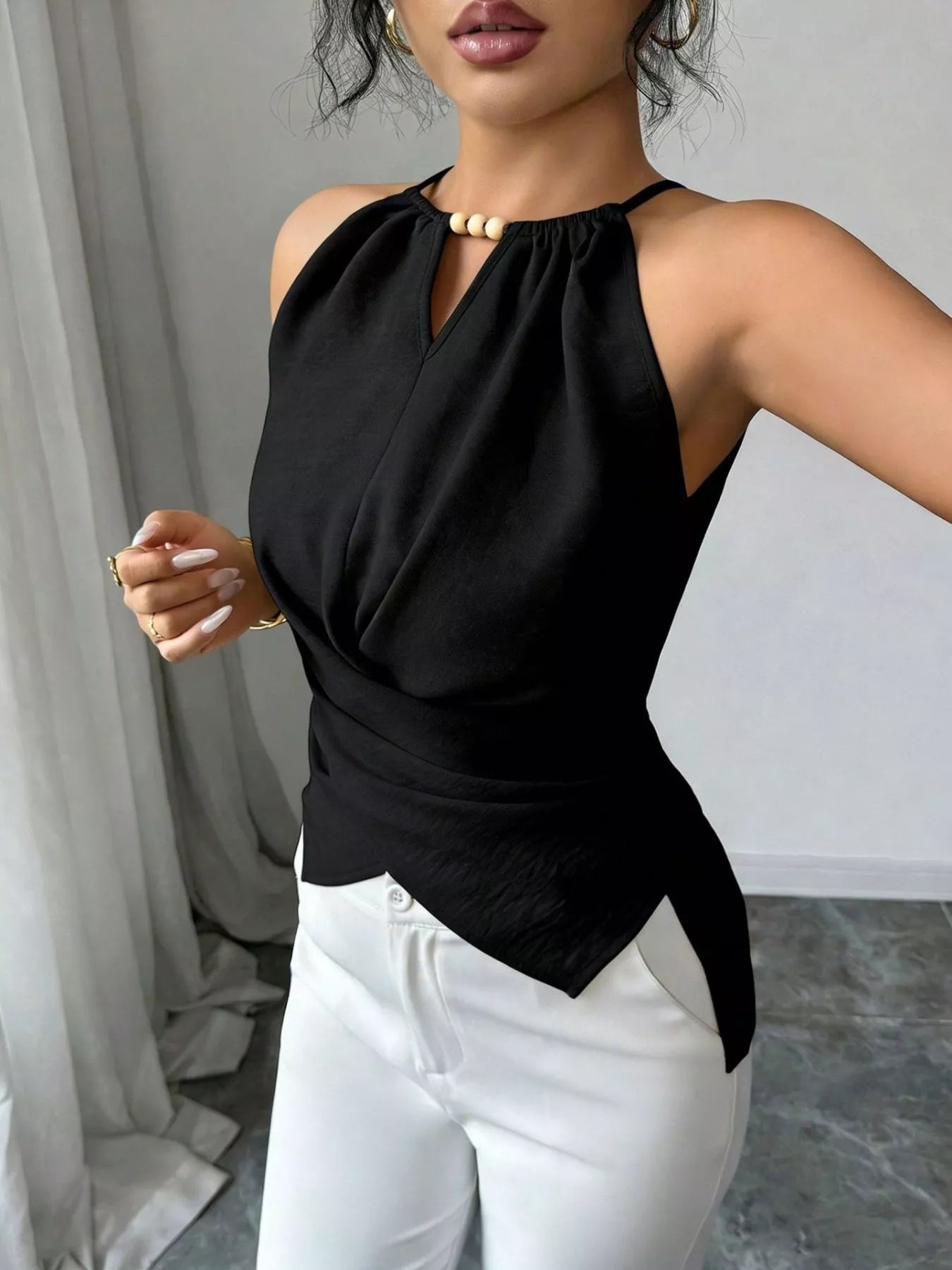 Plush Fashion Hub halter neck crisscross cami tank top with stylish strap details and fitted design, shown on a mannequin.