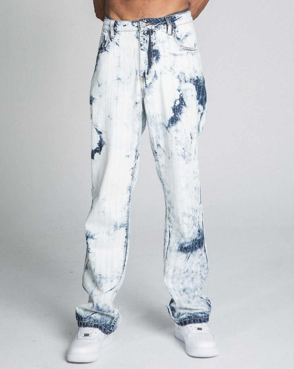 Dark blue and white tie-dye loose jeans by Armor Jeans featuring a relaxed fit and stylish distressed details.