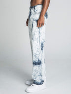 Dark blue and white tie-dye loose jeans by Armor Jeans featuring a relaxed fit and casual style.