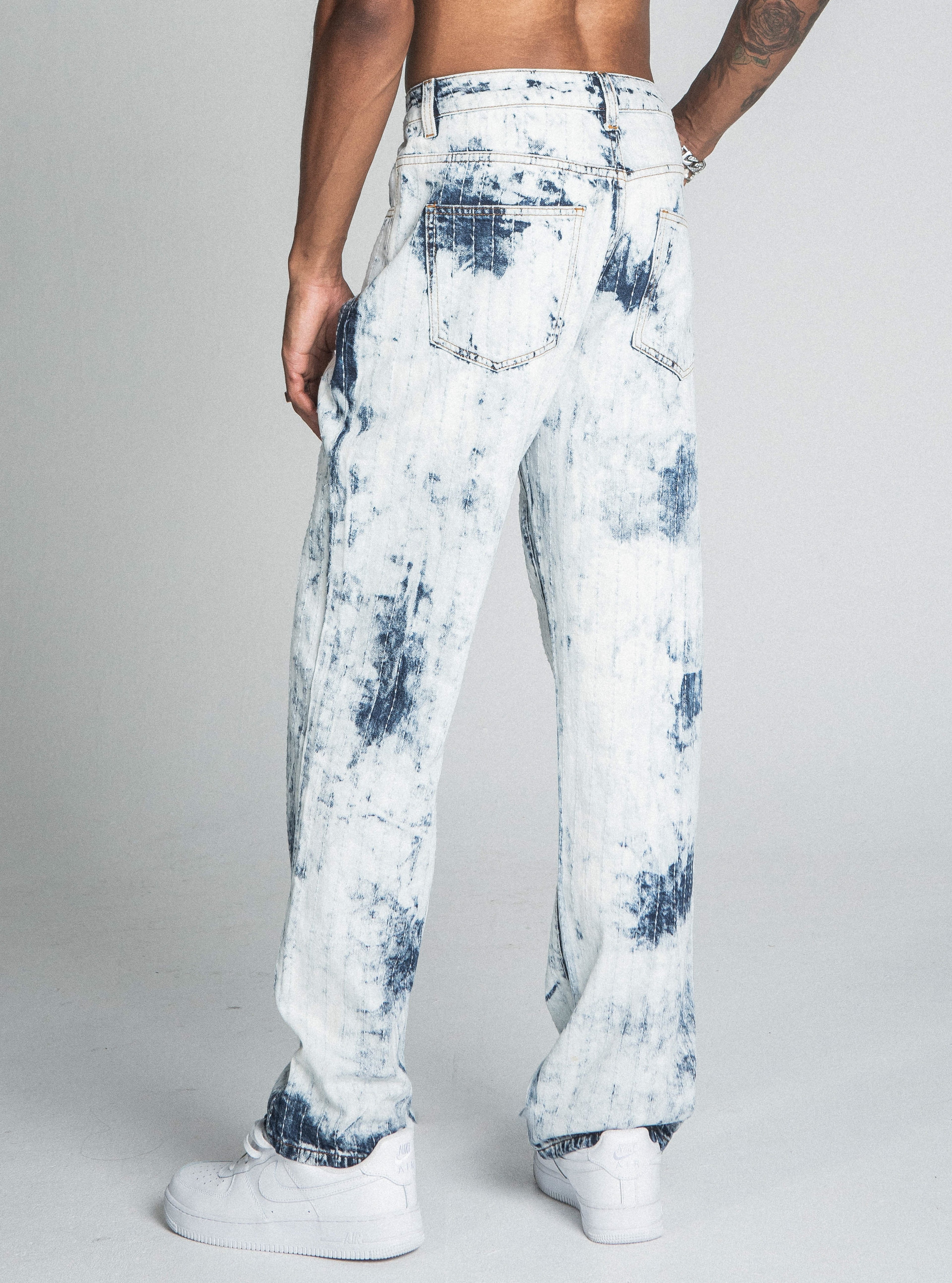 Dark blue and white tie-dye loose jeans from ARMOR JEANS featuring a relaxed fit and casual style.