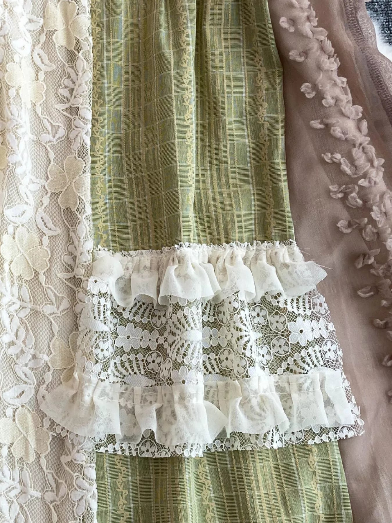 Boho patchwork lace-trimmed A-line tiered dress from Trendsi featuring colorful fabric panels and a flowy silhouette.
