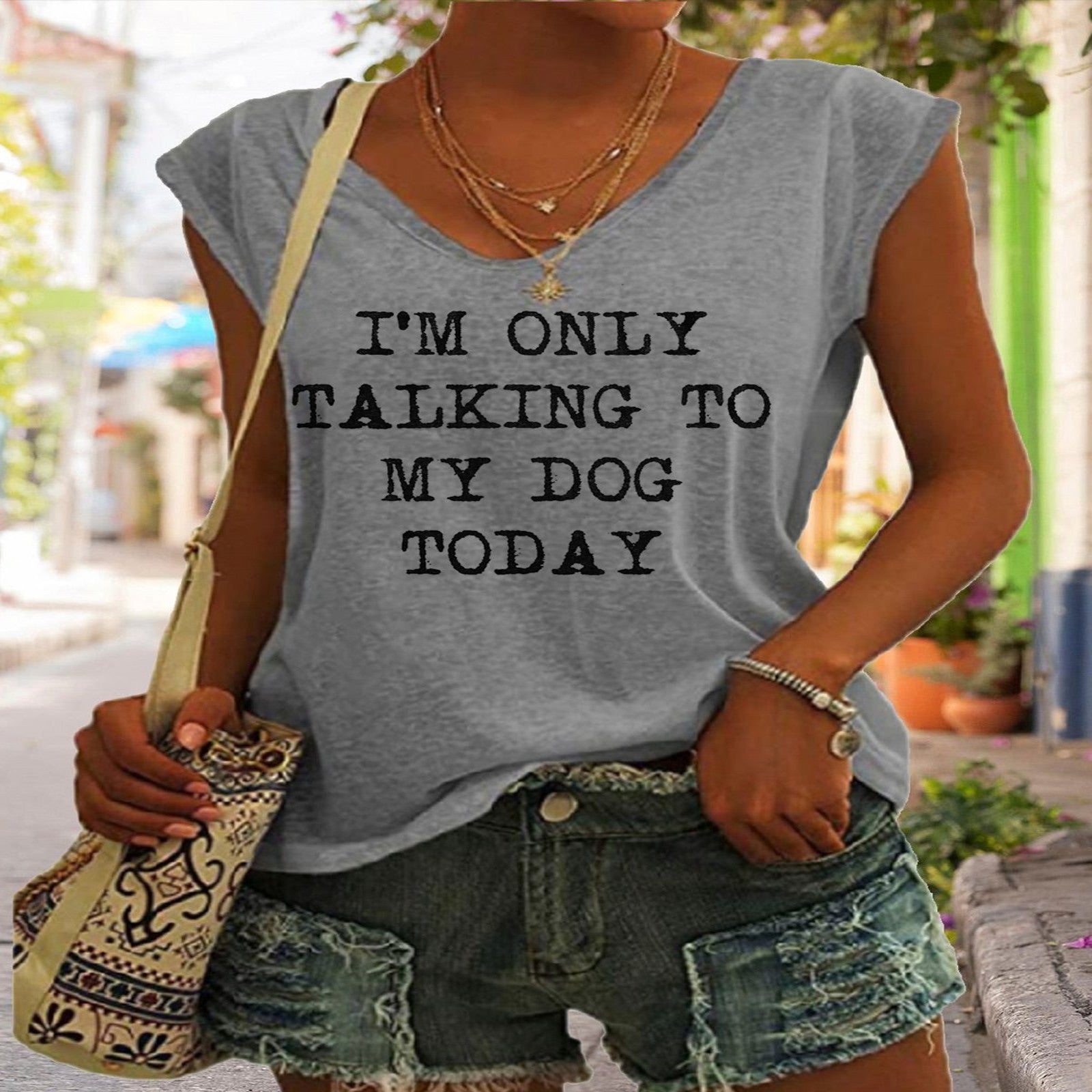 Women's V-neck printed short sleeve T-shirt from Plush Fashion Hub in various colors, featuring a loose fit and casual style.