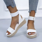 Open toe openwork sandals by Shopimist featuring intricate cutout design and comfortable flat sole.