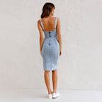 Casual women’s denim jean dress with U-neck and suspenders by FitiqueFit, featuring a relaxed fit and classic denim wash.