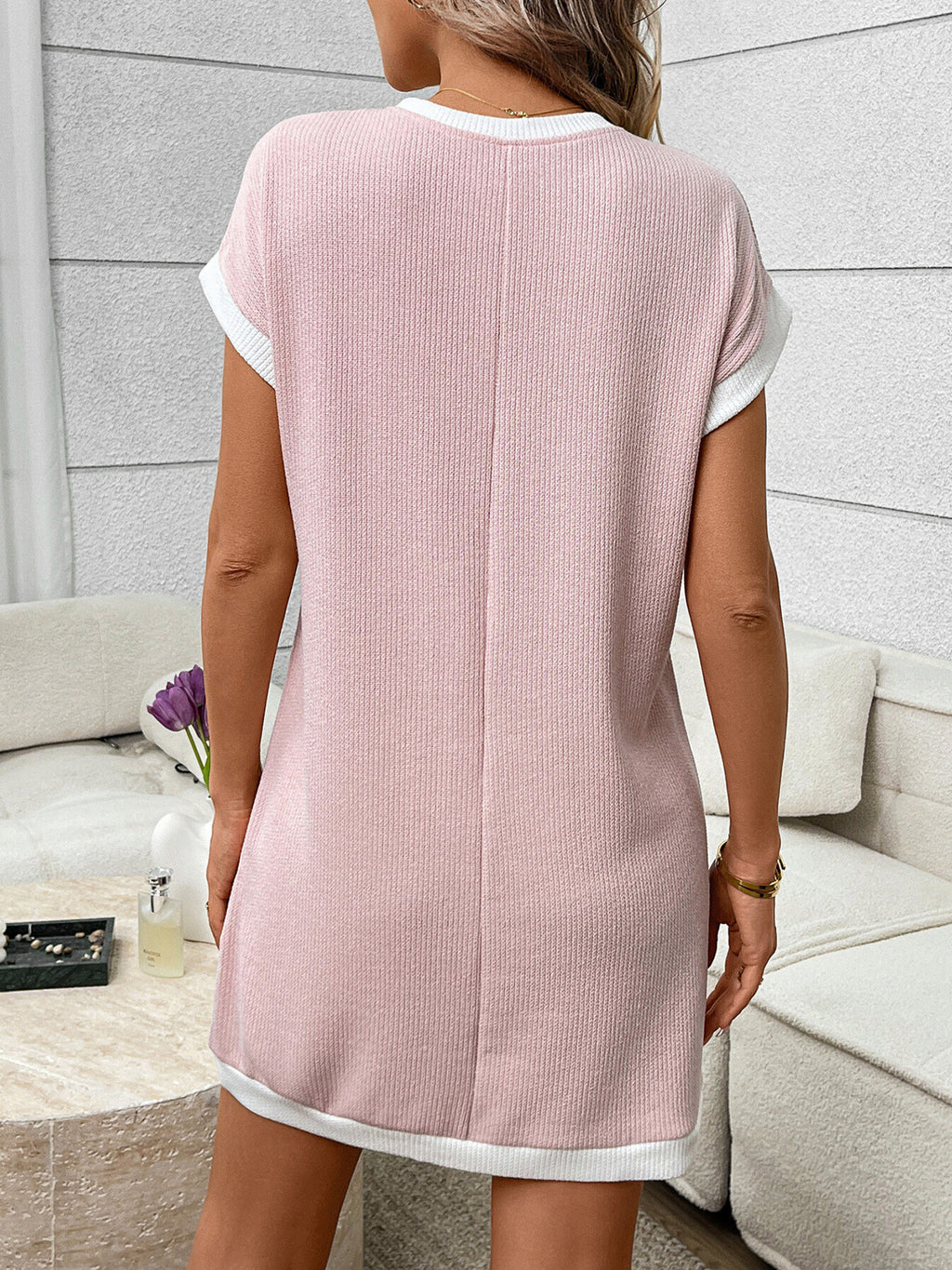 Contrast trim ribbed knit mini dress with functional pocket, featuring a fitted silhouette and stylish design from Trendsi.