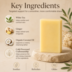 White Tea + Ginger shave bar soap by Timeless Organics Skin Care, featuring a rectangular white soap bar with textured surface.