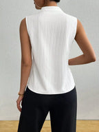 Women's textured notched neck sleeveless tank top from Trendsi, versatile basic shell, showcasing the stylish notch neckline and sleeveless design.