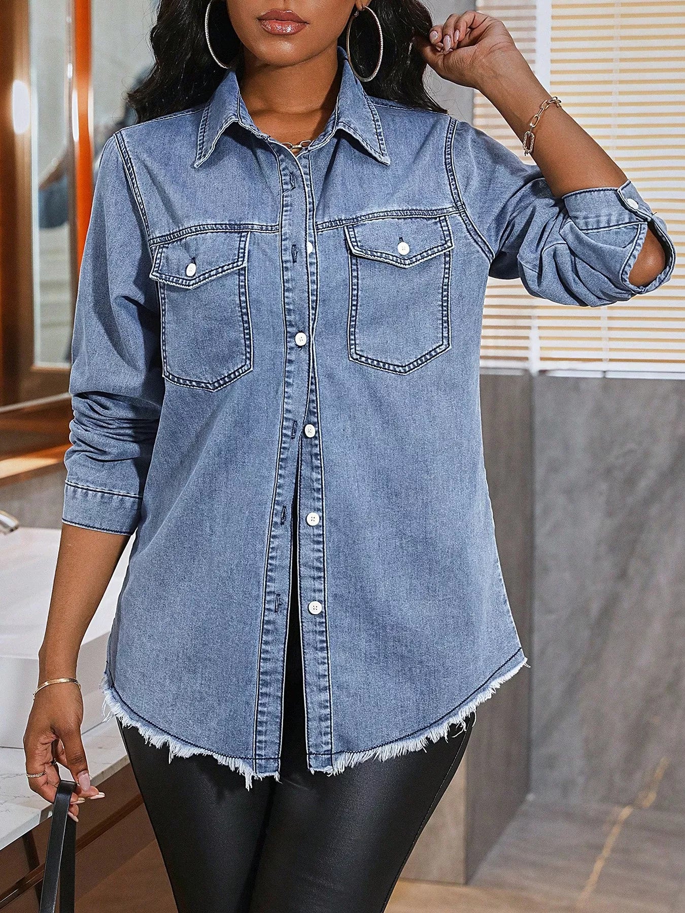 Raw hem button-up denim shirt from Plush Fashion Hub, shown in a casual fit with visible stitching and classic denim fabric.