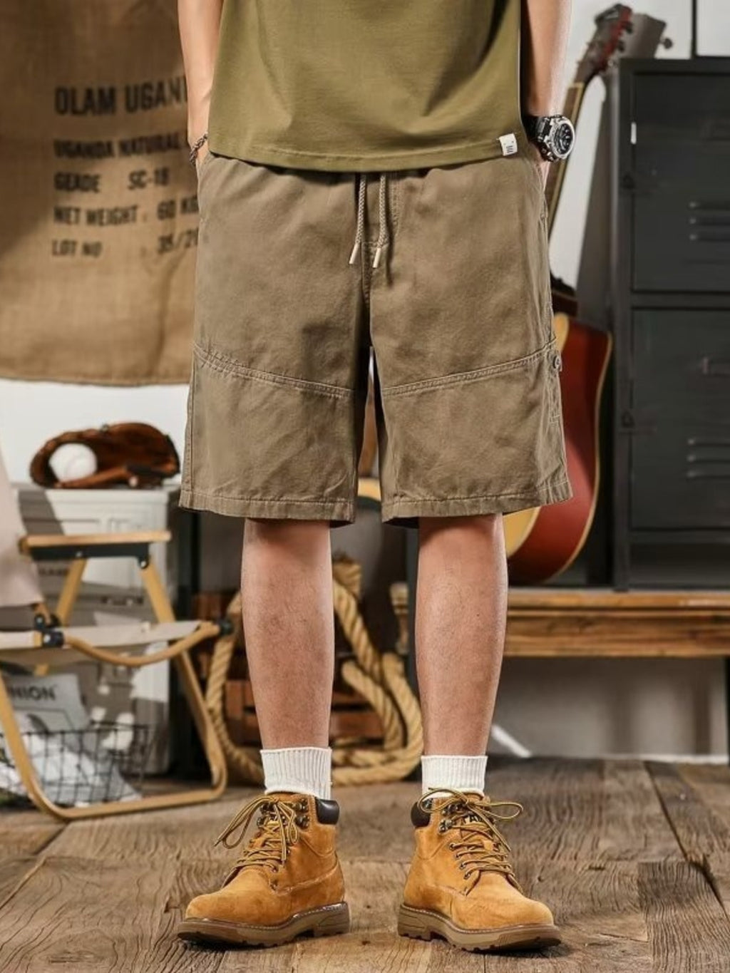 Plus size men's casual drawstring shorts by Trendsi with deep pockets, relaxed fit, comfortable fabric, shown in a casual setting.