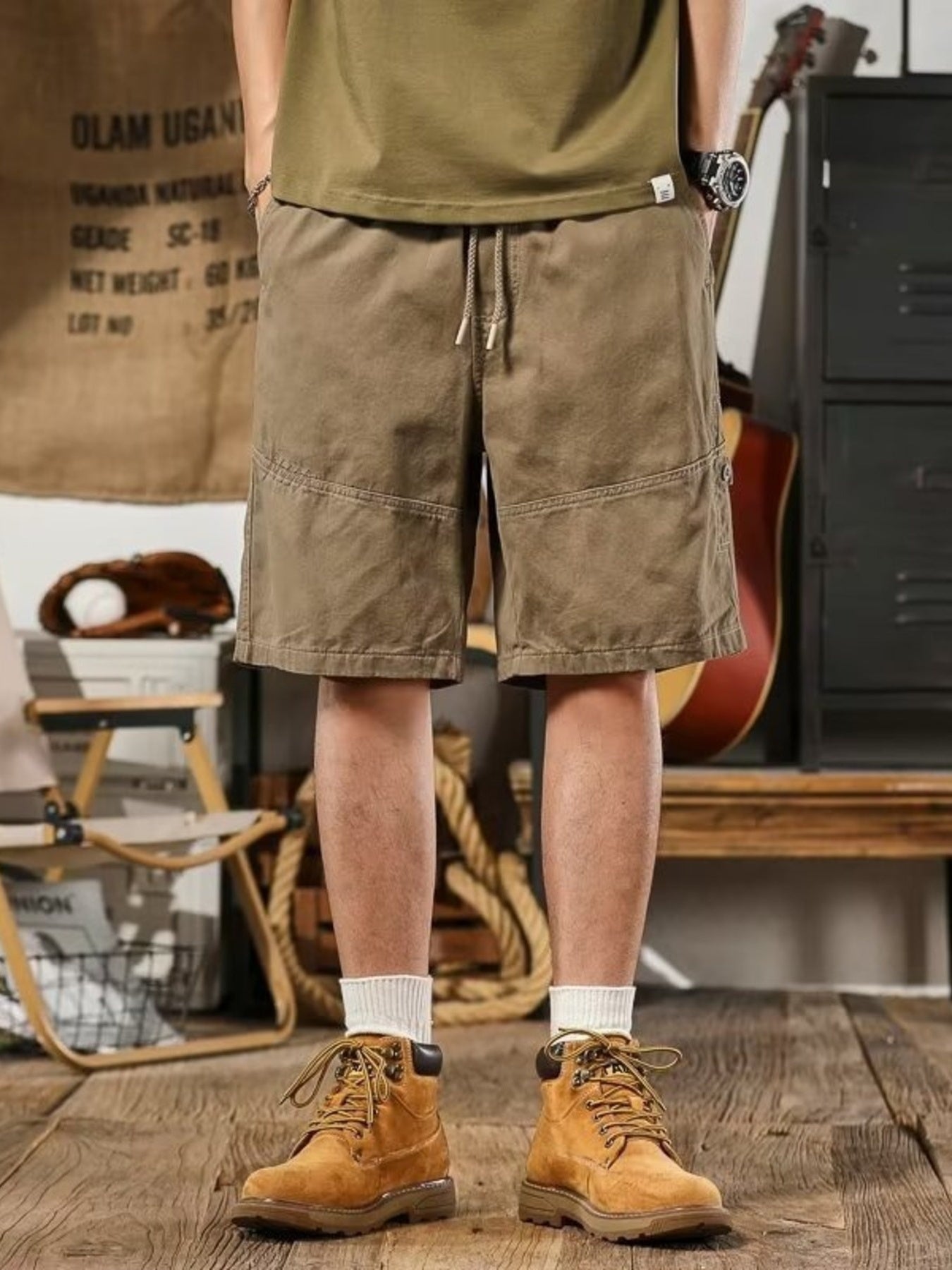Plus size men's casual drawstring shorts by Trendsi with deep pockets, relaxed fit, comfortable fabric, shown in a casual setting.