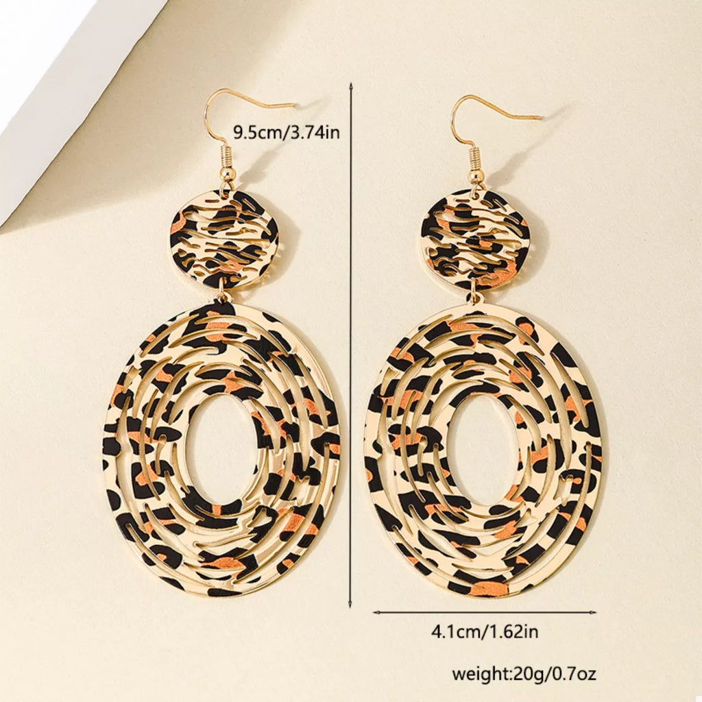 Leopard print dangle earrings from Shopimist featuring gold hooks and bold animal print design.