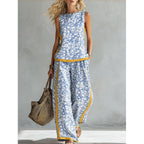 Printed retro sleeveless top and wide-leg pants set from Plush Fashion Hub, featuring vibrant 12 print options in plus sizes.