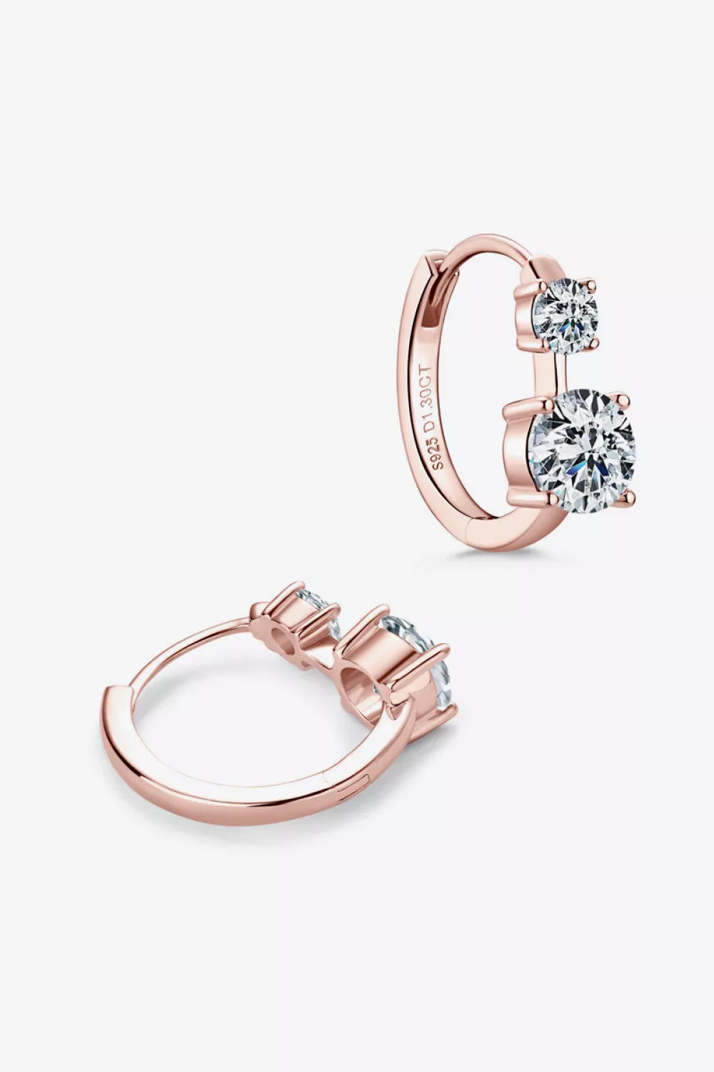 Sterling silver earrings with 1.3 carat moissanite gemstones, featuring a elegant and sparkling jewelry design.