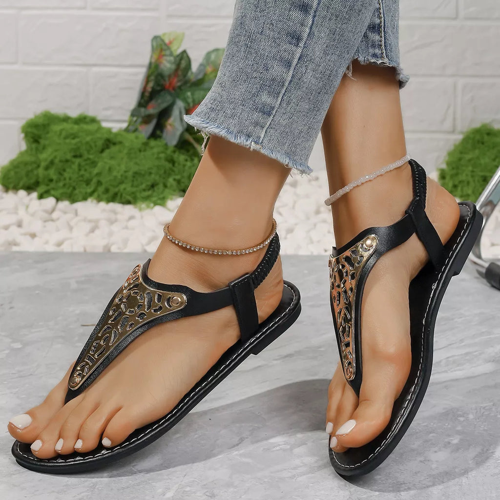 Shopimist toe post flats sandals with minimalist design, featuring a strap and flat sole for casual summer wear.