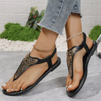 Shopimist toe post flats sandals with minimalist design, featuring a strap and flat sole for casual summer wear.