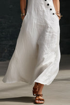 Women's sleeveless button-down midi dress by Trendsi featuring an elegant A-line design, casual wear style, and neutral fabric.