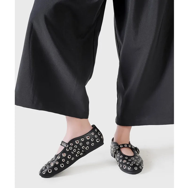 Plush Fashion Hub riveted round toe Mary Jane flats with buckle strap and low heel, in black leather.
