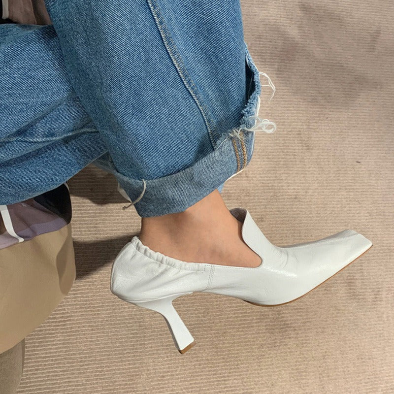 White Elegance square toe stiletto mules by eprolo, stylish heels with a sleek design and pointed toe for a sophisticated look.