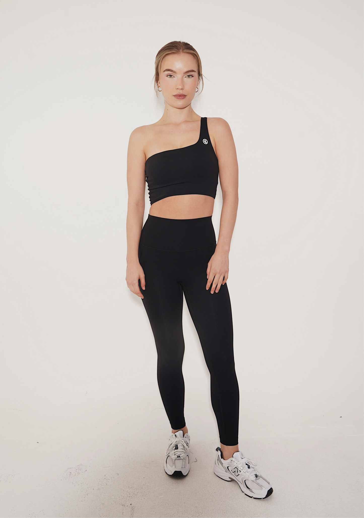 Black I Am Wise tie-up bra by KIMITH BRAND with adjustable straps and lace detailing, designed for comfort and support.