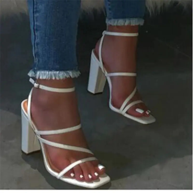 Fashion women's sandals with thick heels, stylish slippers for women, from Trendy Attic Store01, shown in black with open toes.