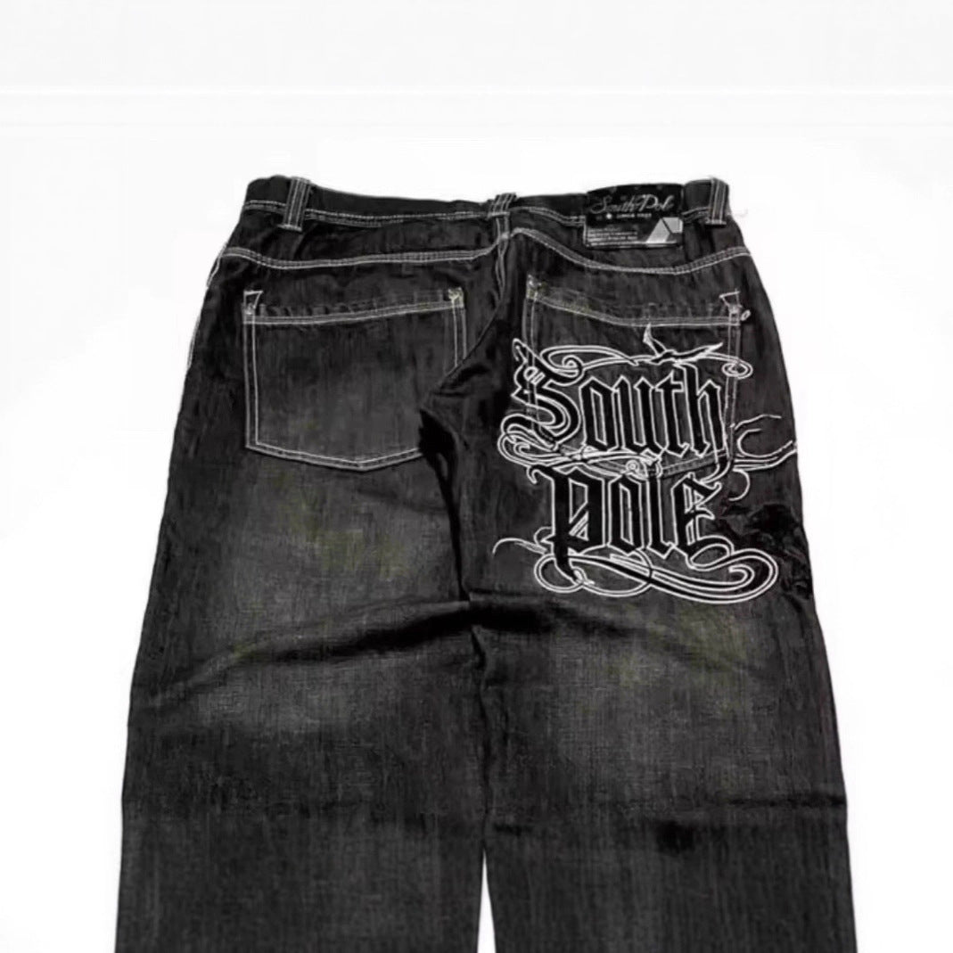 Retro washed wide-leg denim jeans by Plush Fashion Hub, showing the relaxed fit and faded blue denim fabric.