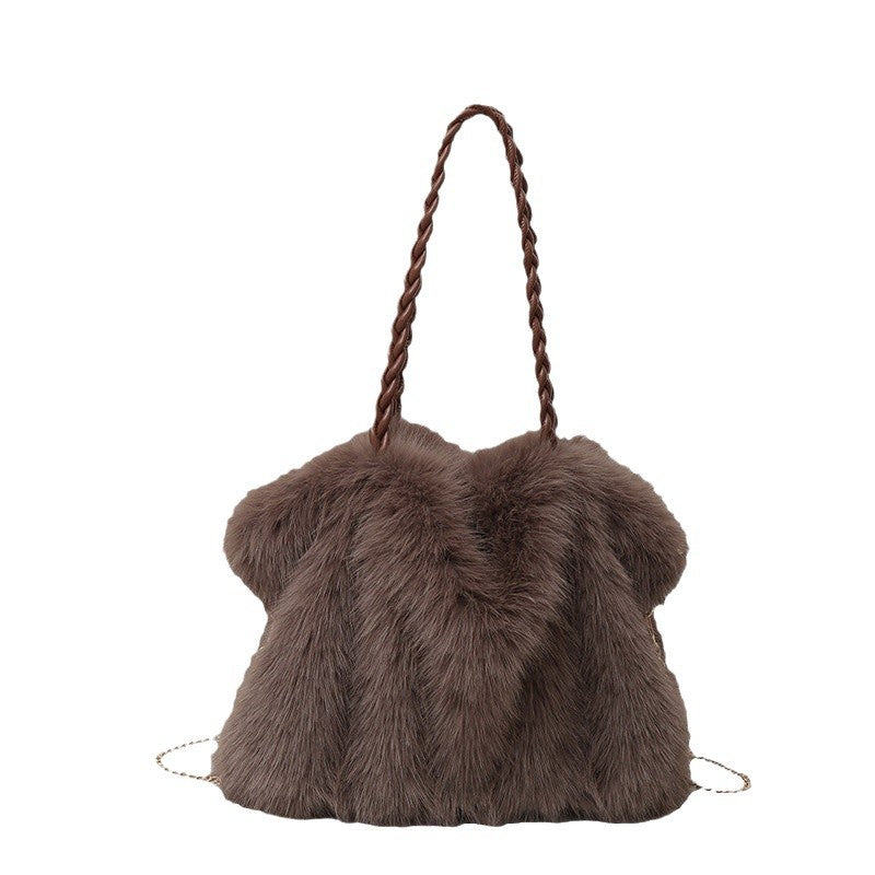 Brown faux fur shoulder bag with braided strap, chevron pattern, and gold-tone chain accents.