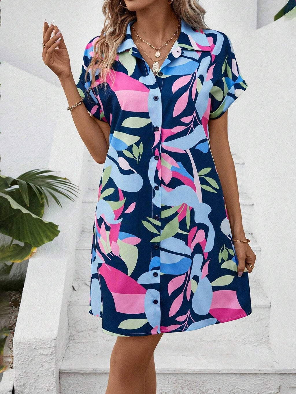 Women's colorful tropical print shirt dress by Plush Fashion Hub featuring button front, short sleeves, collar, and A-line midi style.