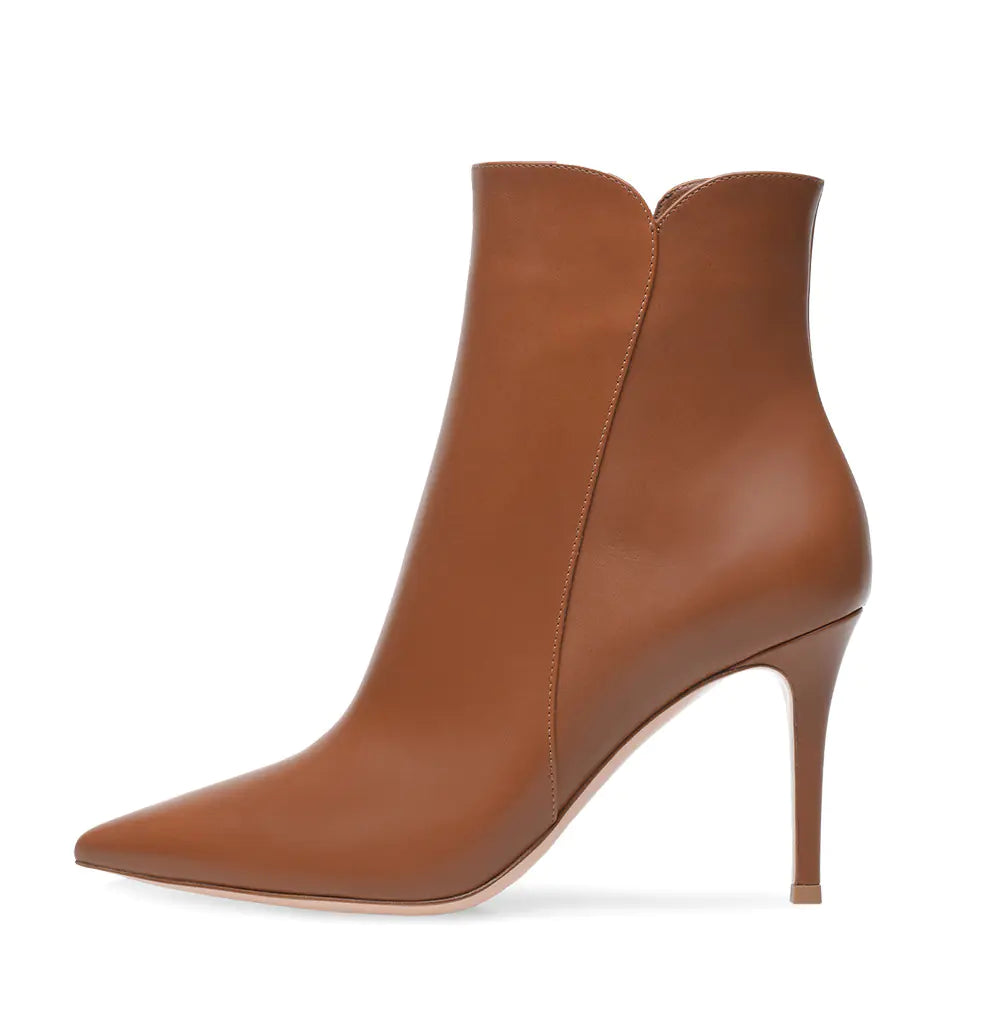 Women's Plush Fashion Hub high heel ankle boots with pointed toes, stylish and sleek for fashionable women's footwear.
