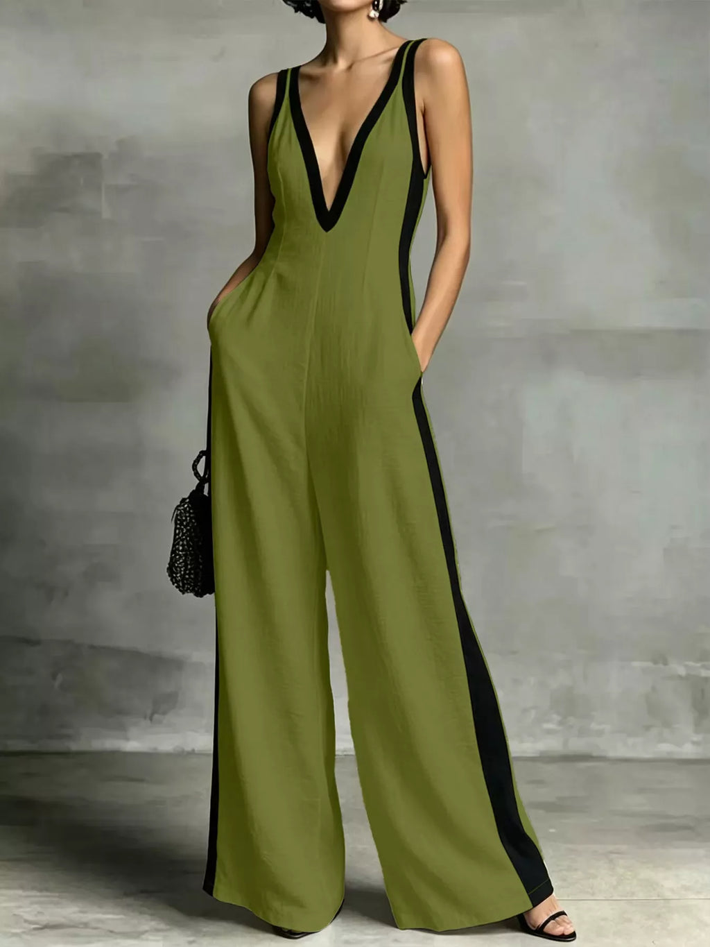 Deep V-neck wide-leg jumpsuit with contrast trim, stylish Shopimist jumpsuit featuring a flattering fit and modern design.