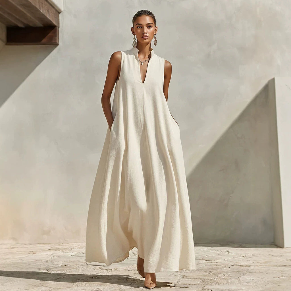 Linen blend sleeveless maxi dress with stand collar in five colors, by FitiqueFit, displayed on a model.