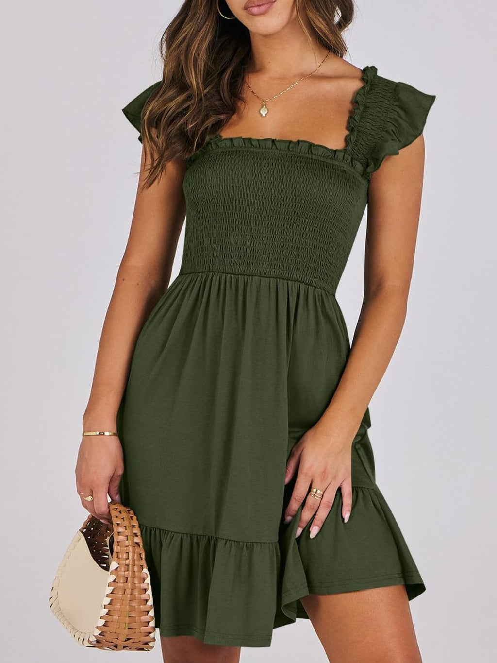 Women's smocked ruffle hem mini dress by Trendsi, casual lightweight summer dress with a flowy silhouette and ruffled hem detail.