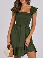 Women's smocked ruffle hem mini dress by Trendsi, casual lightweight summer dress with a flowy silhouette and ruffled hem detail.