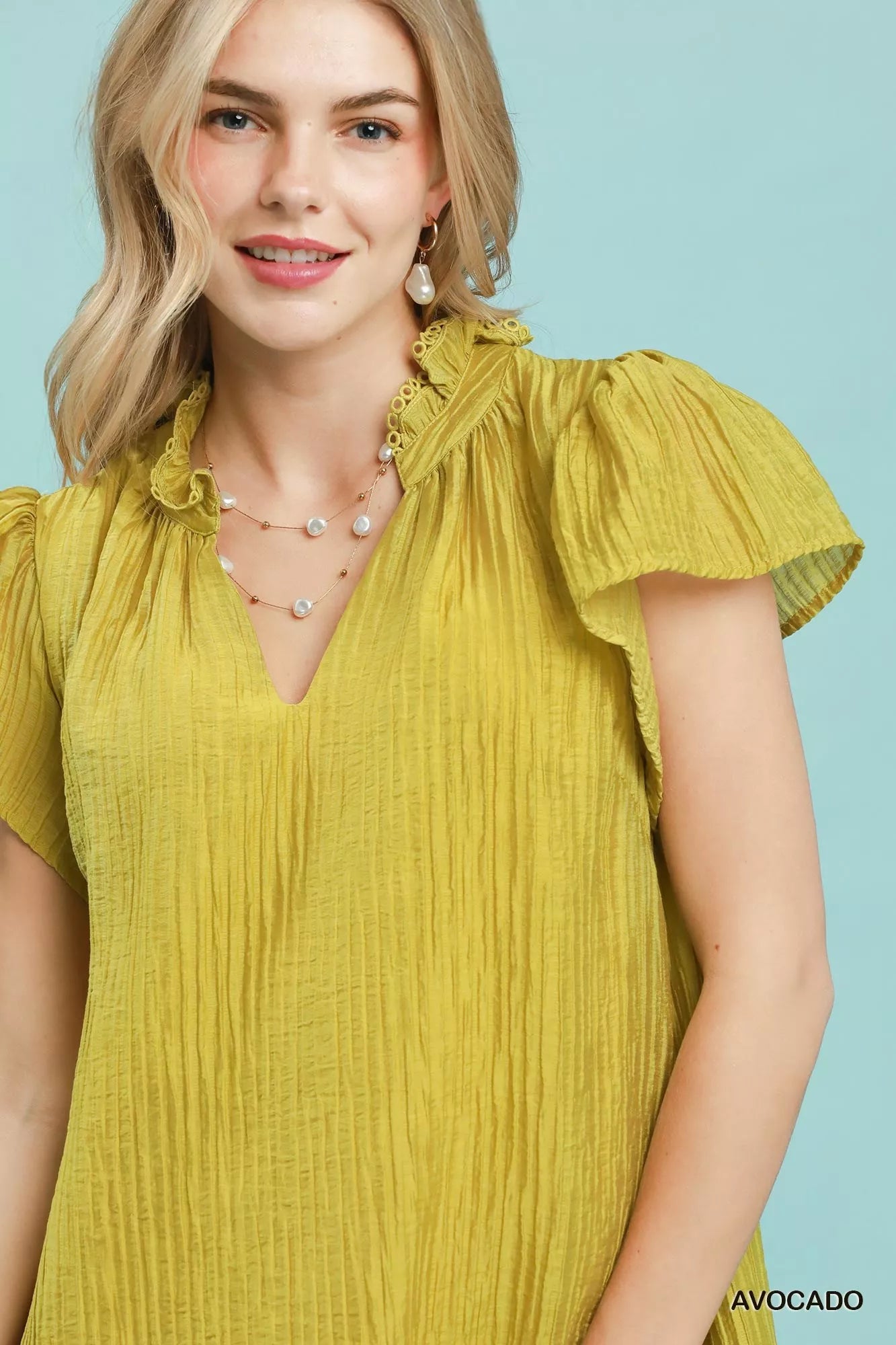 Umgee textured ruffle hem mini dress featuring a stylish design, perfect for casual or semi-formal occasions.