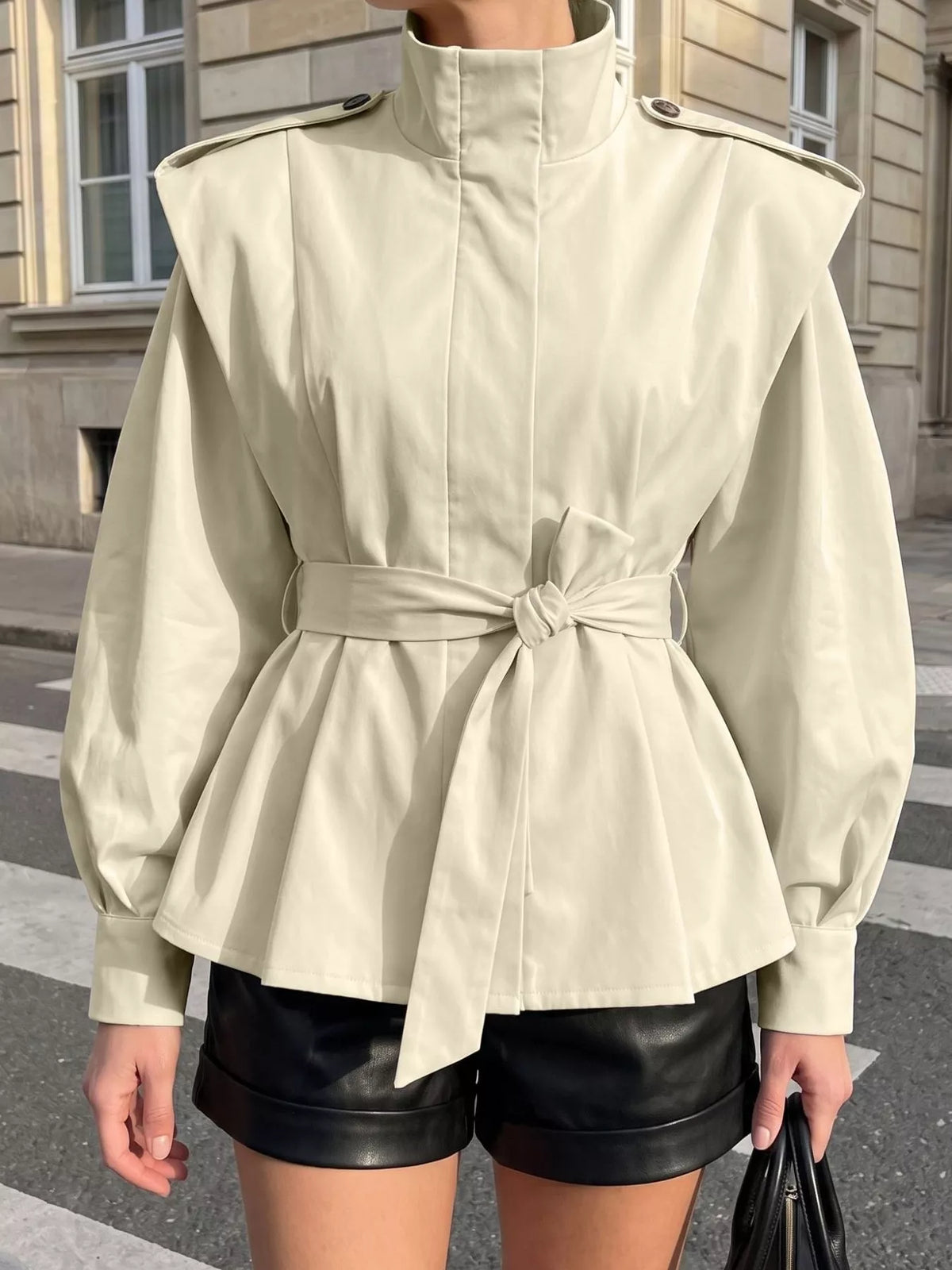 Trendsi stand-collar belted outerwear, stylish outerwear with a fitted silhouette and belt detail, displayed on a hanger.