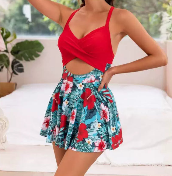 Women's FitiqueFit cutout sling one-piece swimsuit with built-in chest pad and skirt hem, featuring a stylish design and supportive fit.