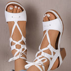 Women's chic lace-up block heel sandals with strappy design and mid-height heels, stylish footwear by Trendsi.