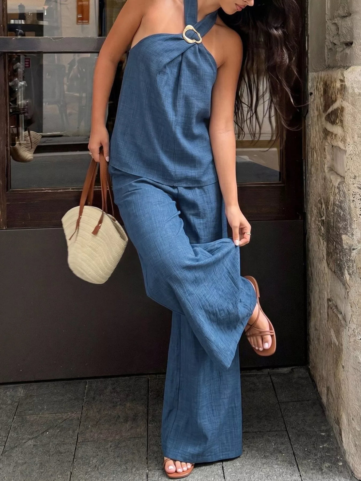 Plush Fashion Hub halter neck top and wide-leg pants set, stylish two-piece outfit featuring a fitted top and flowy pants.