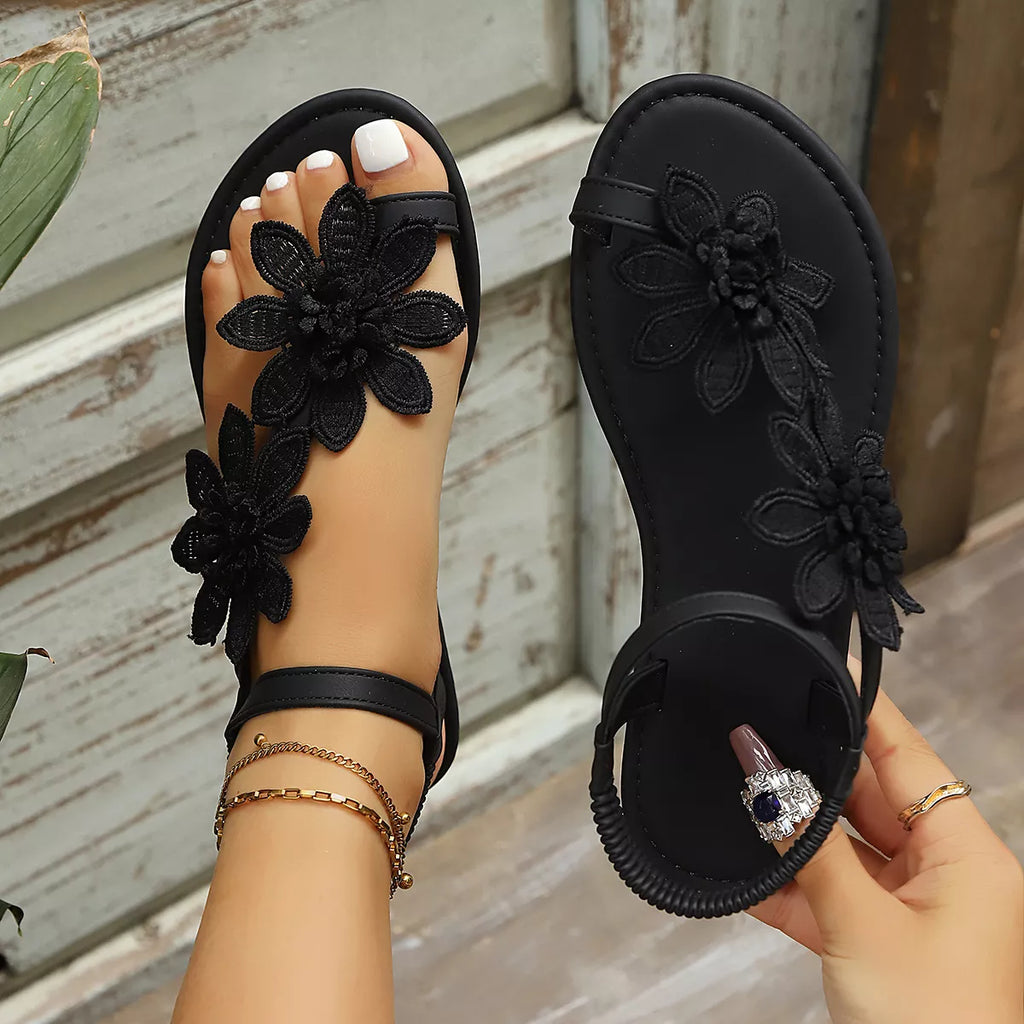 Floral embellished flat sandals by Shopimist featuring colorful flower details and comfortable open-toe design.