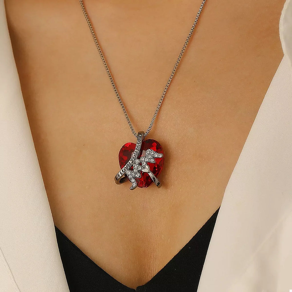 Heart-shaped MOM pendant necklace by Shopimist featuring a silver heart charm on a delicate chain.
