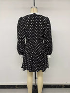 Polka dot Peter Pan collar dress by Shopimist featuring a classic design with a rounded collar and playful polka dot pattern.