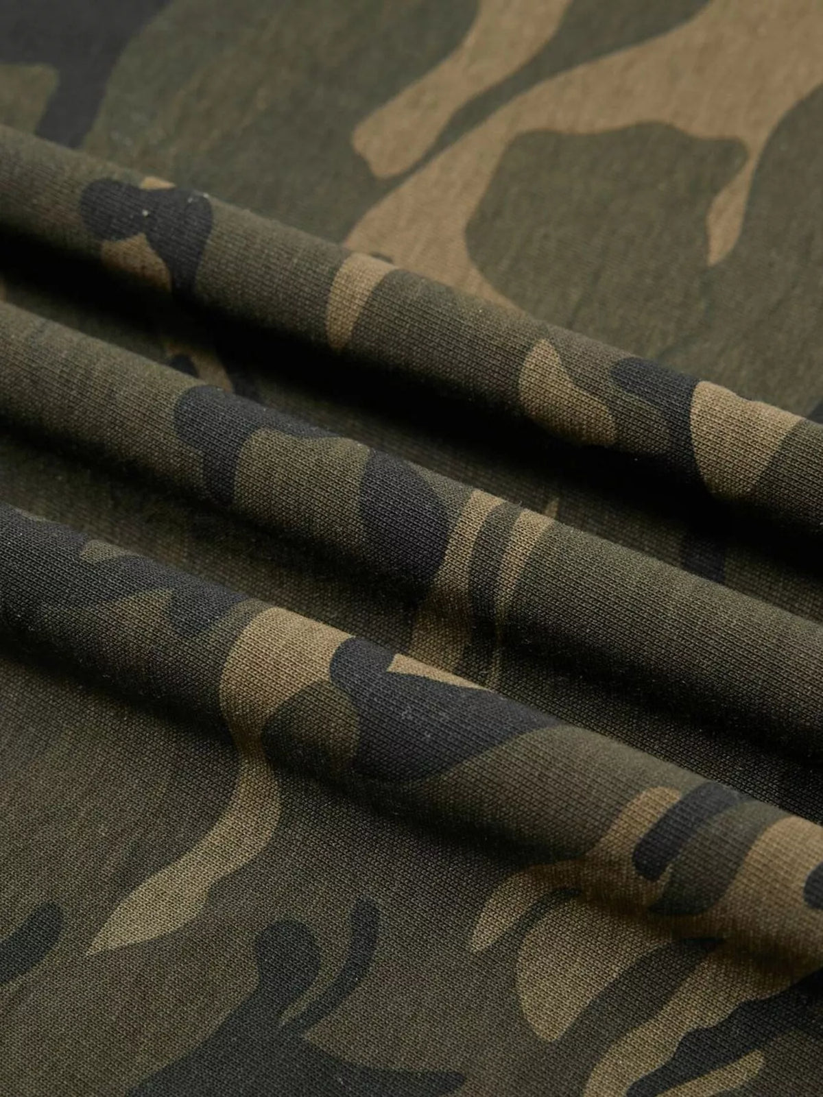 Men's camouflage print short sleeve T-shirt from Plush Fashion Hub, showing front view with classic military pattern and comfortable fit.