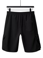 Plus size men's drawstring pocketed shorts by Trendsi, featuring a comfortable fit and casual style.