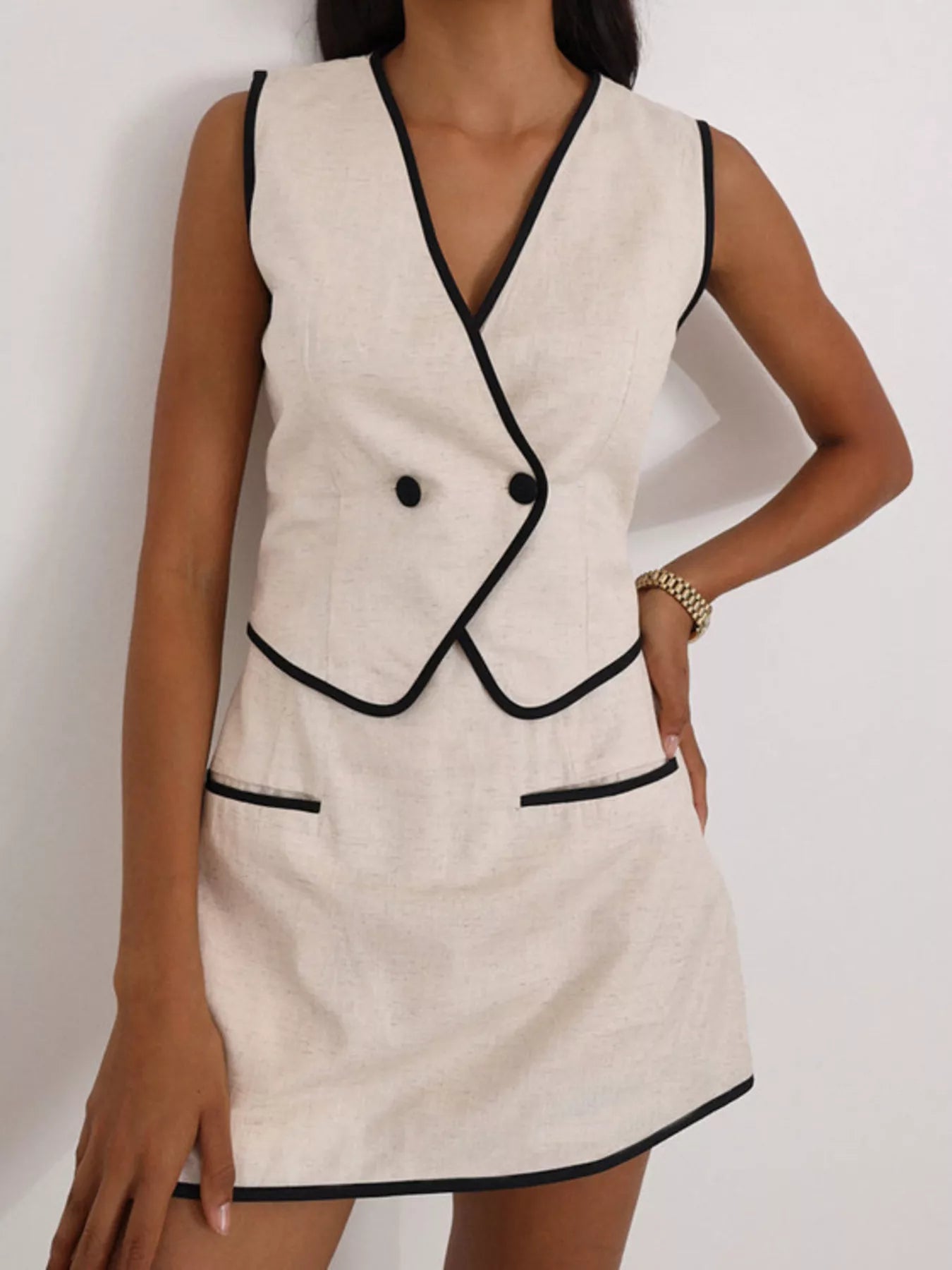 Contrast trim vest and skirt set from Plush Fashion Hub, featuring a stylish two-piece outfit with bold trim details.