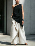 Women's one-shoulder asymmetric sleeveless top from Plush Fashion Hub, featuring a stylish and modern design.