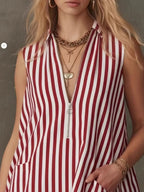 Striped zipper neck ruffle hem dress by Shopimist featuring vertical stripes, a zipper neckline, and a flowy ruffle hem.