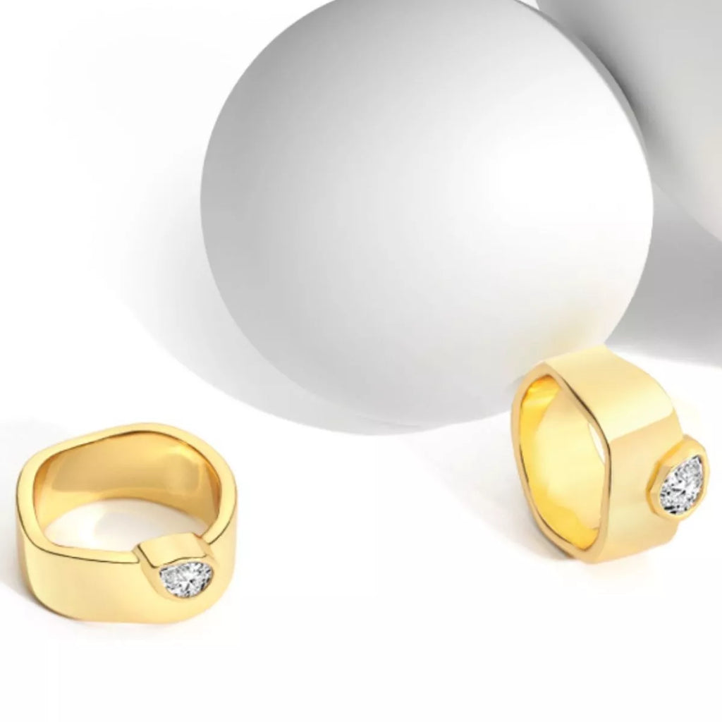 18K gold-plated minimalist design ring with sleek band, showcasing elegant craftsmanship and modern style.