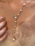 Pearl flower Y-necklace from Shopimist featuring delicate white pearls and floral design, elegant jewelry for special occasions.